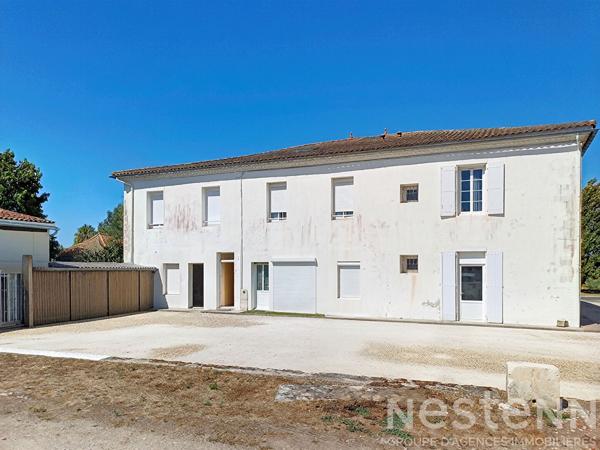 immeuble de 9 appartements,une maison individuelle et 4 garages déjà loués !