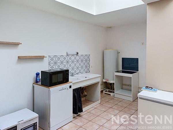 immeuble de 9 appartements,une maison individuelle et 4 garages déjà loués !