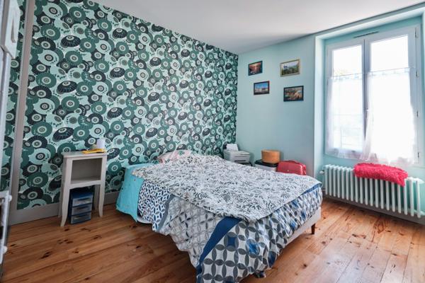 Maison avec jardin, à proximité du centre-ville