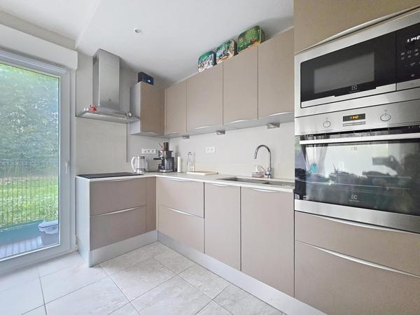 Appartement 3 chambres dans copropriété de 2018 - 2 places de stationnement en sous-sol