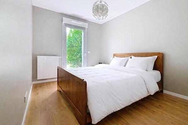 Appartement 3 chambres dans copropriété de 2018 - 2 places de stationnement en sous-sol