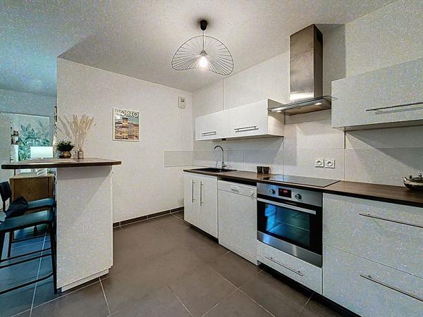 Appartement Lyon Monplaisir 2 pièces en rez-de-jardin avec terrasse garage et cave