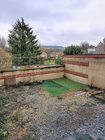 Maison de ville 70 m² – Fort potentiel locatif – À rénover