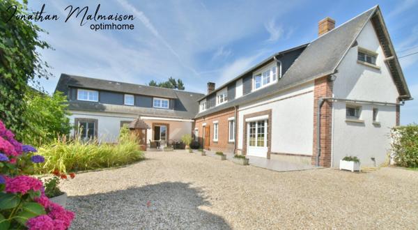 Maison de Caractère avec Dépendances sur une Parcelle Arborée de plus de 3000 m²