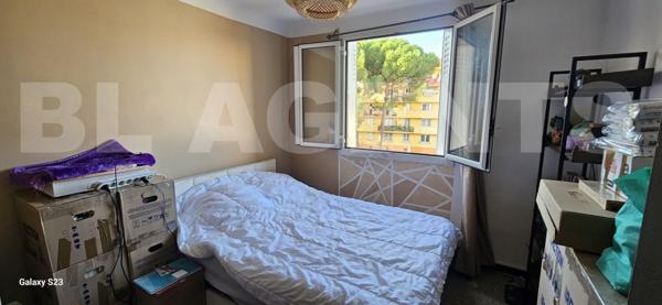 T3 avec balcon et cave