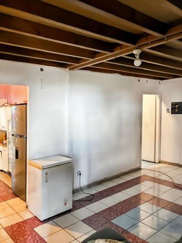 Maison bourbon bois à rénover de 97 m² avec mezzanine sur terrain de 343m2 – Enorme potentiel – Idéale famille nombreuse dans quartier paisible LA POSSESSION