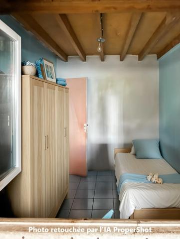 Maison bourbon bois à rénover de 97 m² avec mezzanine sur terrain de 343m2 – Enorme potentiel – Idéale famille nombreuse dans quartier paisible LA POSSESSION