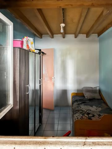 Maison bourbon bois à rénover de 97 m² avec mezzanine sur terrain de 343m2 – Enorme potentiel – Idéale famille nombreuse dans quartier paisible LA POSSESSION