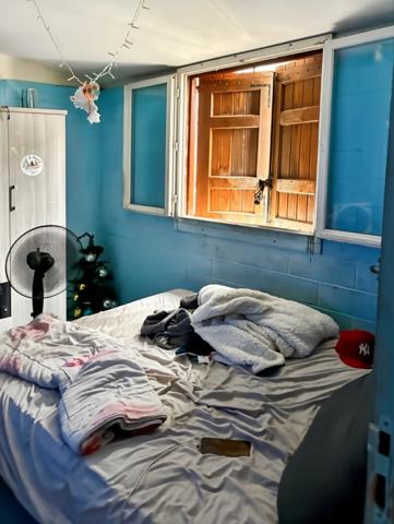 Maison bourbon bois à rénover de 97 m² avec mezzanine sur terrain de 343m2 – Enorme potentiel – Idéale famille nombreuse dans quartier paisible LA POSSESSION