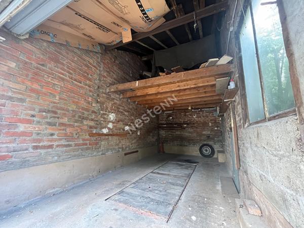 Maison des années 30 en briques avec jardin et garages- Charme et Potentiel sur la colline de Puteaux