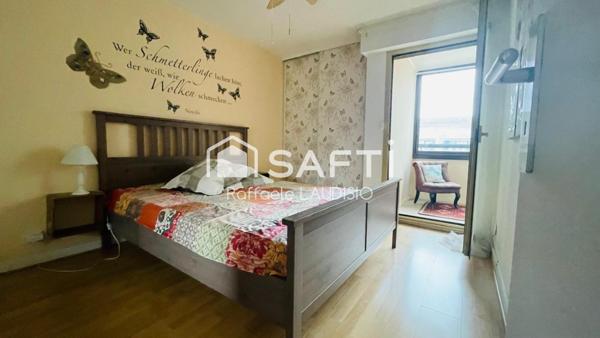 Appartement T3 de 66 m², cave, parking centre ville