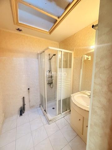 Exclusivité - Maison avec jardin et beau potentiel !
