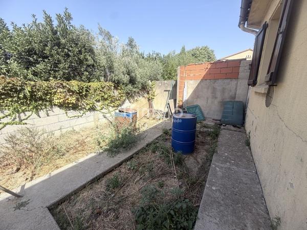 Exclusivité - Maison avec jardin et beau potentiel !