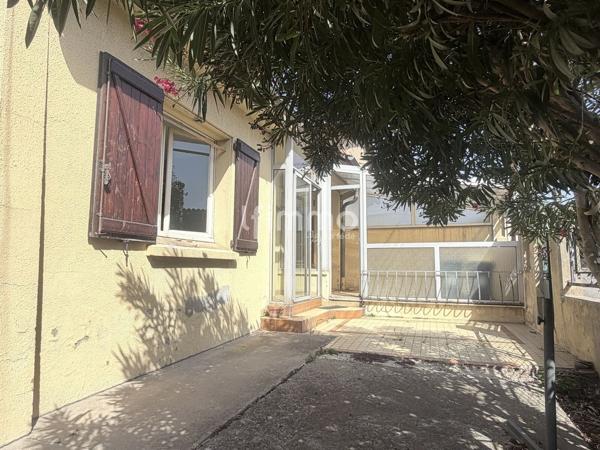 Exclusivité - Maison avec jardin et beau potentiel !