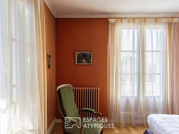 Maison familiale au coeur d’un jardin arboré