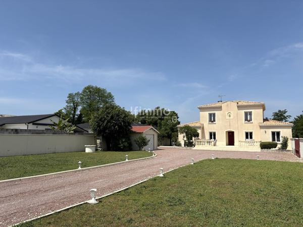 Maison familiale avec piscine, jardin constructible et dépendance