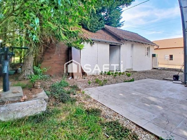 Charmante maison avec terrain arboré, garage et dépendance