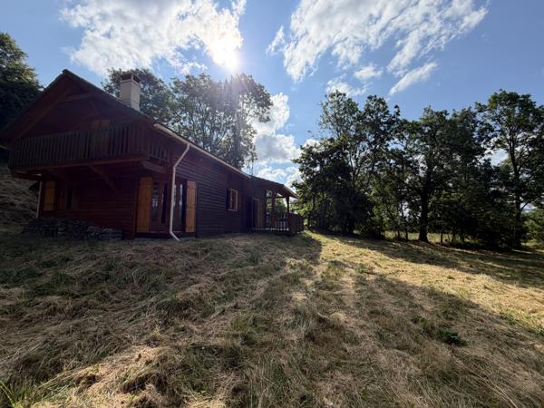 *SOUS COMROMIS* CHALET SUR LES HAUTEURS DE LAVEISSIERE