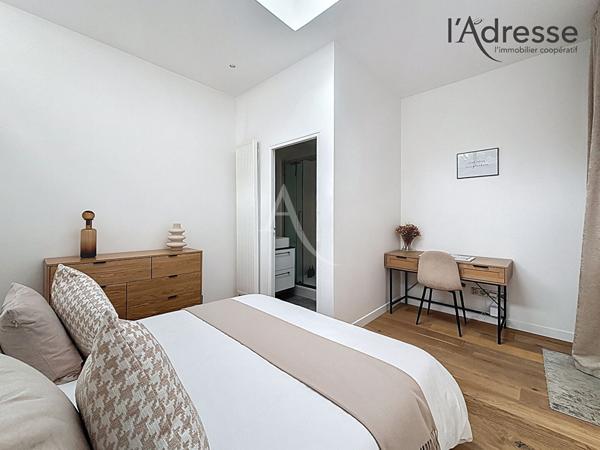 Suresnes République - Appartement d'architecte entièrement rénové - 3 pièces 64m² avec patio - CAVE