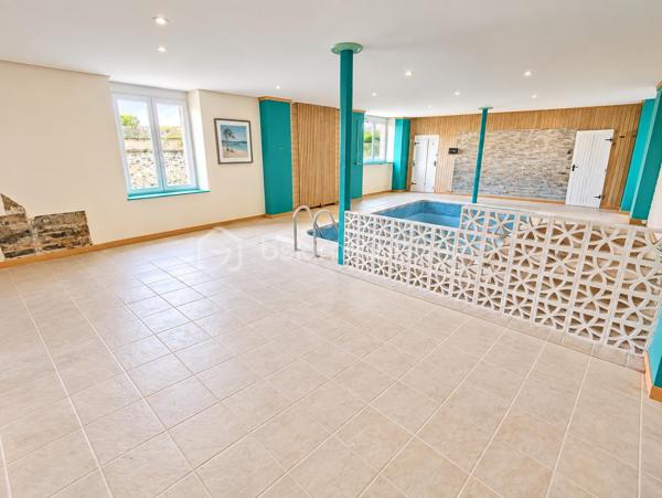 Propriété Rare en centre ville de Fougères à l'abri des regards 
Cette maison à caractère d'habitation dans une petite cour privatisée sera vous satisfaire par ses volumes et ses prestations.

Maison de 213 m2 - 5 chambres
Annexes de 220 m2 - Espace Aquatique, Garage, 4 bureaux ou chambres

Elle se compose de la manière suivante :
Au Rez de chaussée : Entrée avec placard, Bureau ou Chambre de plain pied, Cuisine ouverte, un grand espace Salle à manger - Salon avec cheminée insert, le tout communiquant sur la terrasse extérieur. 
Espace aquatique, Sauna, Garage, placard et WC séparé.

A l'étage '' en 2 parties"
Côté Gauche : Une mezzanine pouvant servir de bureau, Une belle grande Salle de bain avec douche et doubles vasques,
3 chambres dont une avec mezzanine accédant à une autre chambre 

Côté Droit : 4 Bureaux ou chambres, WC séparé

Les ailes peuvent communiquées entre elle avec quelques aménagements, rafraichissement à réaliser à plusieurs niveaux
A l'extérieur, Cour Pavé arboré avec coin barbecue, une dépendance et un poulailler

Assainissement Tout à l'égout, Chauffage Gaz de ville, Double vitrage en majeur partie

Nota: Le Côté Droit possède sa propre entrée indépendante.
Bien idéal pour résidence principale ou propice à un investissement locatif ou les deux
Croquis et surface en image