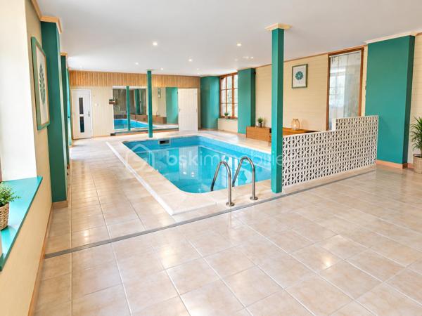 Propriété Rare en centre ville de Fougères à l'abri des regards 
Cette maison à caractère d'habitation dans une petite cour privatisée sera vous satisfaire par ses volumes et ses prestations.

Maison de 213 m2 - 5 chambres
Annexes de 220 m2 - Espace Aquatique, Garage, 4 bureaux ou chambres

Elle se compose de la manière suivante :
Au Rez de chaussée : Entrée avec placard, Bureau ou Chambre de plain pied, Cuisine ouverte, un grand espace Salle à manger - Salon avec cheminée insert, le tout communiquant sur la terrasse extérieur. 
Espace aquatique, Sauna, Garage, placard et WC séparé.

A l'étage '' en 2 parties"
Côté Gauche : Une mezzanine pouvant servir de bureau, Une belle grande Salle de bain avec douche et doubles vasques,
3 chambres dont une avec mezzanine accédant à une autre chambre 

Côté Droit : 4 Bureaux ou chambres, WC séparé

Les ailes peuvent communiquées entre elle avec quelques aménagements, rafraichissement à réaliser à plusieurs niveaux
A l'extérieur, Cour Pavé arboré avec coin barbecue, une dépendance et un poulailler

Assainissement Tout à l'égout, Chauffage Gaz de ville, Double vitrage en majeur partie

Nota: Le Côté Droit possède sa propre entrée indépendante.
Bien idéal pour résidence principale ou propice à un investissement locatif ou les deux
Croquis et surface en image
