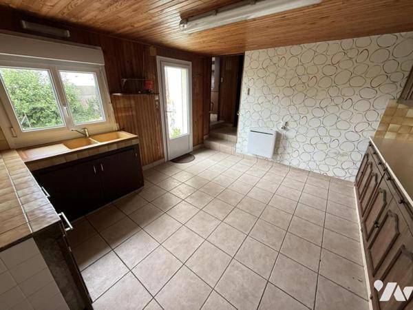 Maison à proximité immédiate du centre bourg avec garage