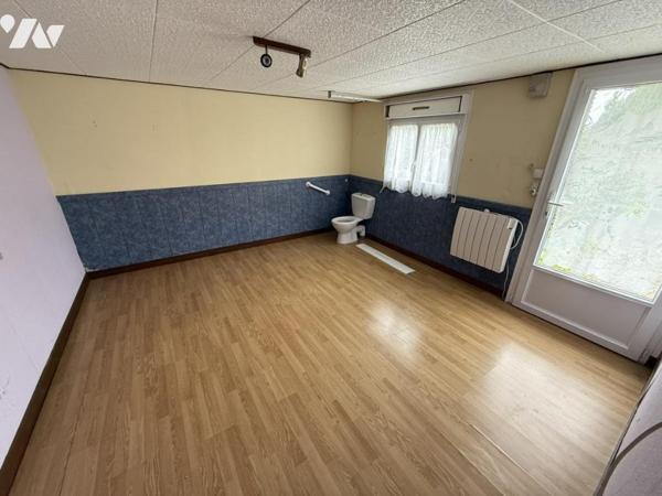 Maison à proximité immédiate du centre bourg avec garage