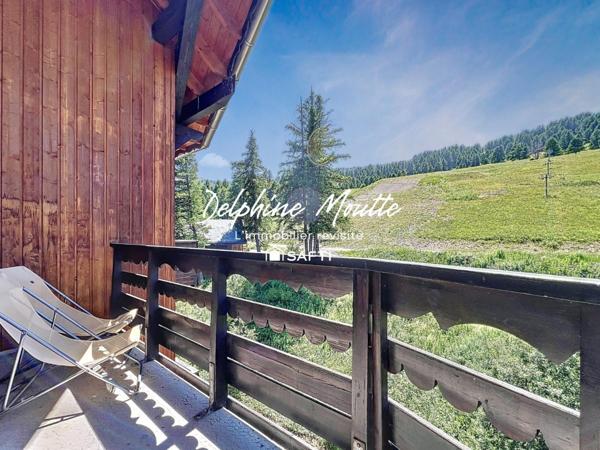 Appartement de 29 m2 4 à 6 couchages skis aux pieds- front de neige. Au calme