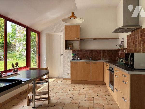 QUEVERT - DINAN : ensemble de 2 maisons avec jardin clos d'environ 721m²