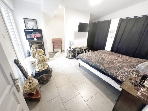 Maison 8 pièce(s) 5 chambre(s) 200 m²