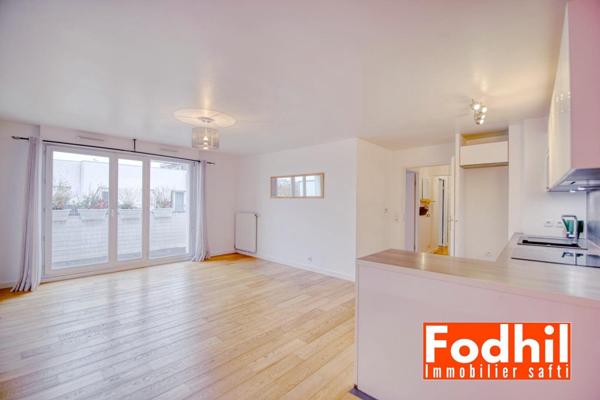 Appartement familial 5 pièces- 2 parkings et cave.