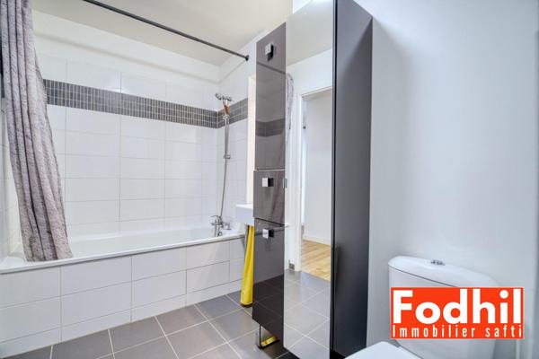 Appartement familial 5 pièces- 2 parkings et cave.