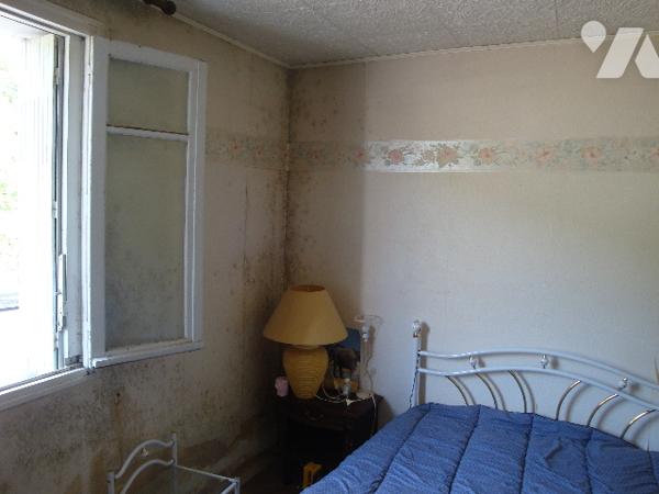 MOISSAC : centre ville, proche gare, maison T4, 3 chambres,  90 m2, et garage (45m2), jardin 140 m2.