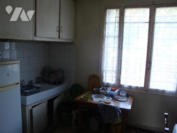 MOISSAC : centre ville, proche gare, maison T4, 3 chambres,  90 m2, et garage (45m2), jardin 140 m2.