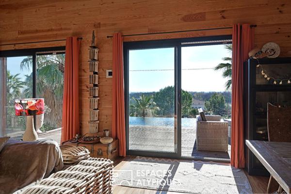 Chaleureuse maison à ossature bois avec vue