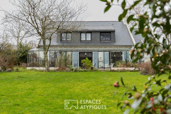 Maison familiale avec jardin d’hiver et jardin arboré