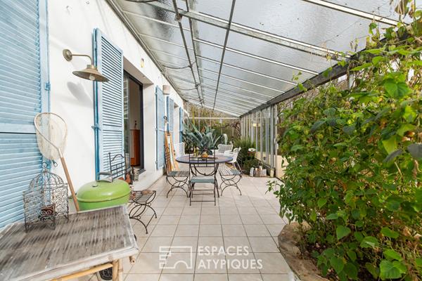 Maison familiale avec jardin d’hiver et jardin arboré