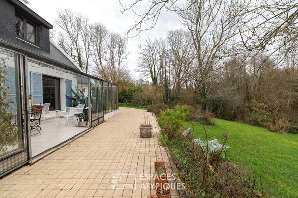 Maison familiale avec jardin d’hiver et jardin arboré