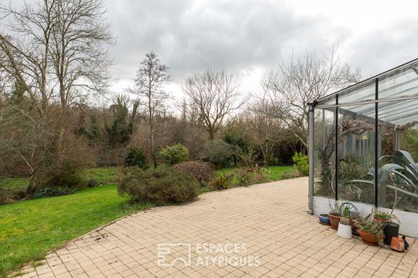 Maison familiale avec jardin d’hiver et jardin arboré