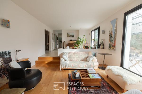 Maison familiale avec jardin d’hiver et jardin arboré