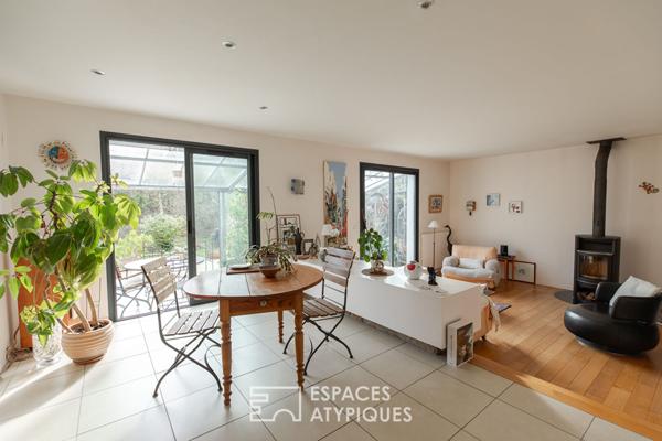 Maison familiale avec jardin d’hiver et jardin arboré