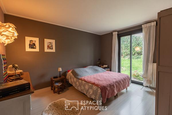 Maison familiale avec jardin d’hiver et jardin arboré