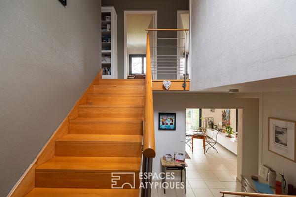 Maison familiale avec jardin d’hiver et jardin arboré