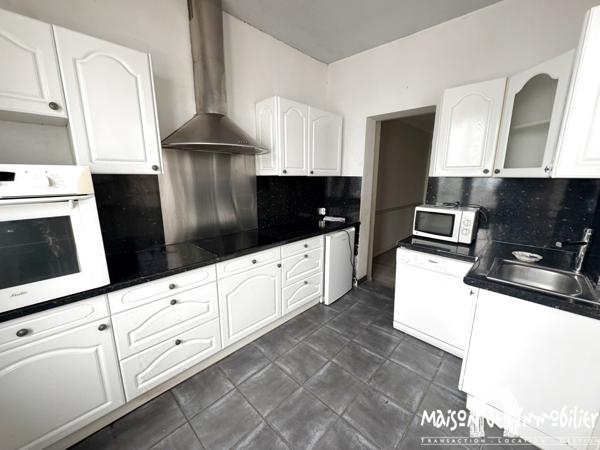 Vente Maison de plain-pied - 3 pièces - 72m² - Proche tous commerces à pied - Jardinet, garage et cave