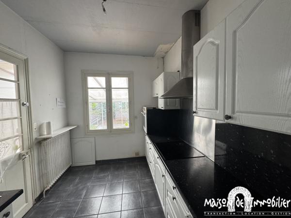 Vente Maison de plain-pied - 3 pièces - 72m² - Proche tous commerces à pied - Jardinet, garage et cave