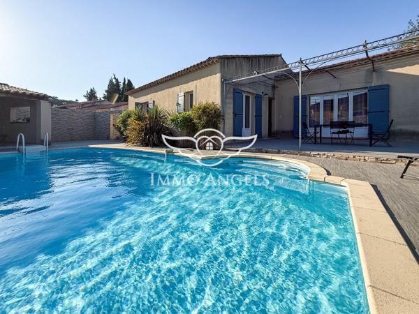 Maison de plain-pied, 134 m2 sur terrain de 1010 m2 avec piscine.