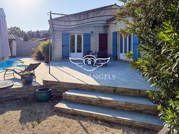 Maison de plain-pied, 134 m2 sur terrain de 1010 m2 avec piscine.