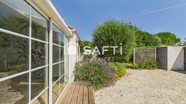 Maison pleine de charme avec jardin.