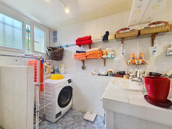 Maison mitoyenne de 99 m2 avec jardin et dépendance