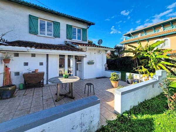 Maison mitoyenne de 99 m2 avec jardin et dépendance
